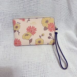 Brand new Coach wristlet
